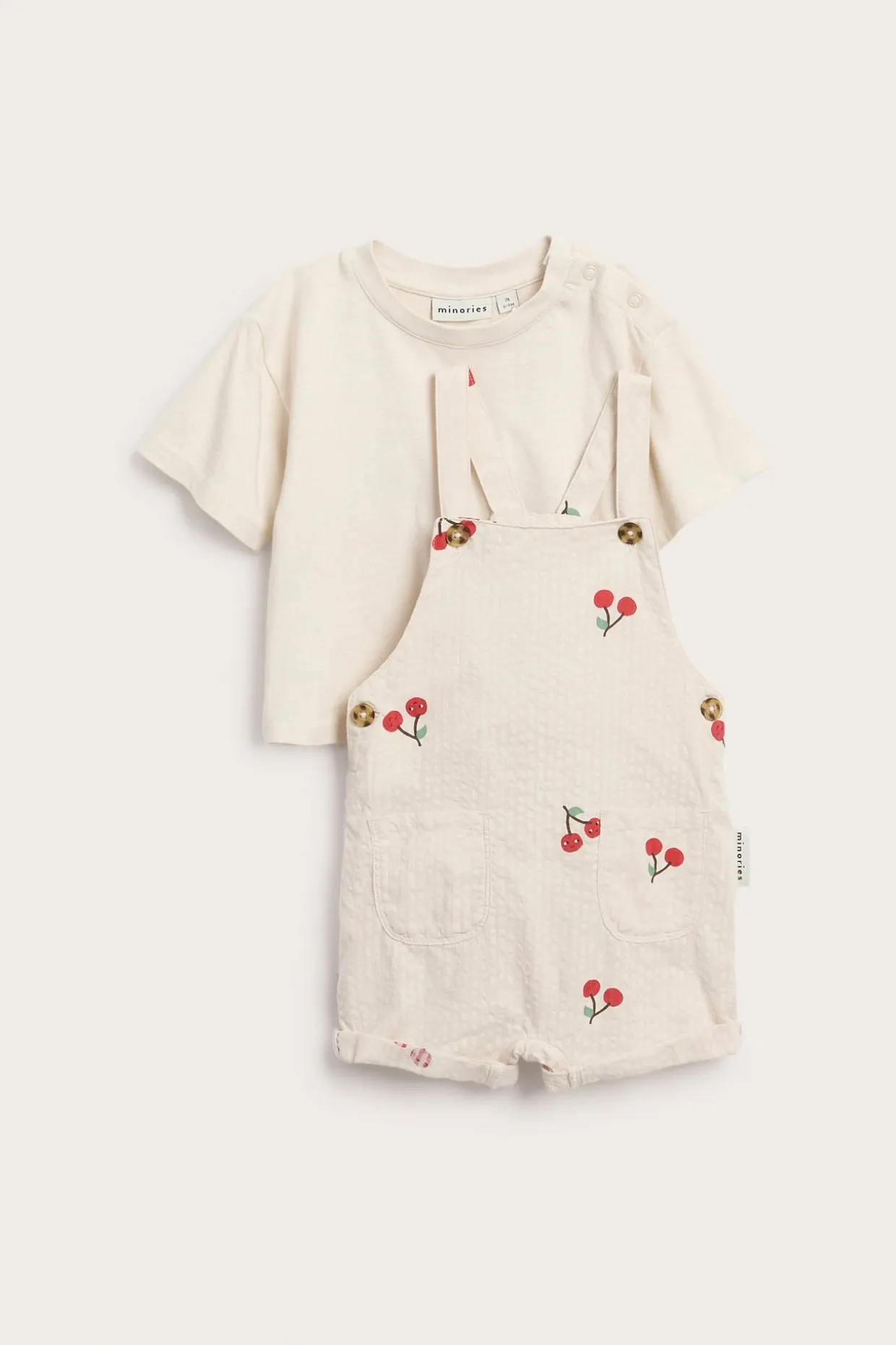 Babyset med mönster av körsbär