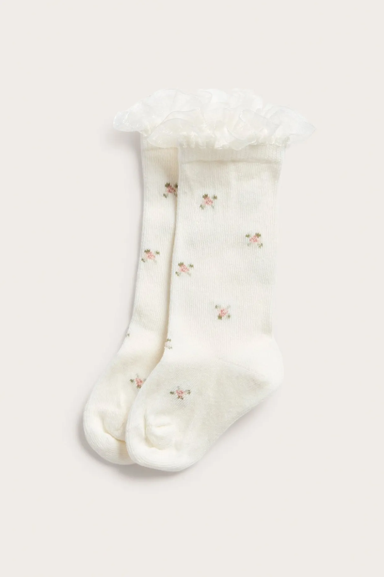 Blommiga knästrumpor med volang