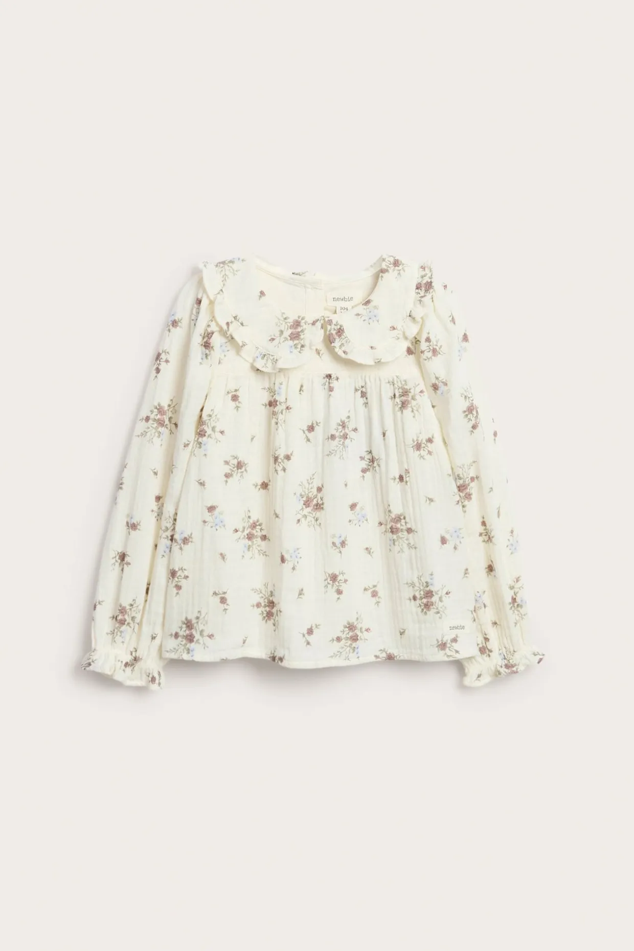 Blommig blus med volangkrage