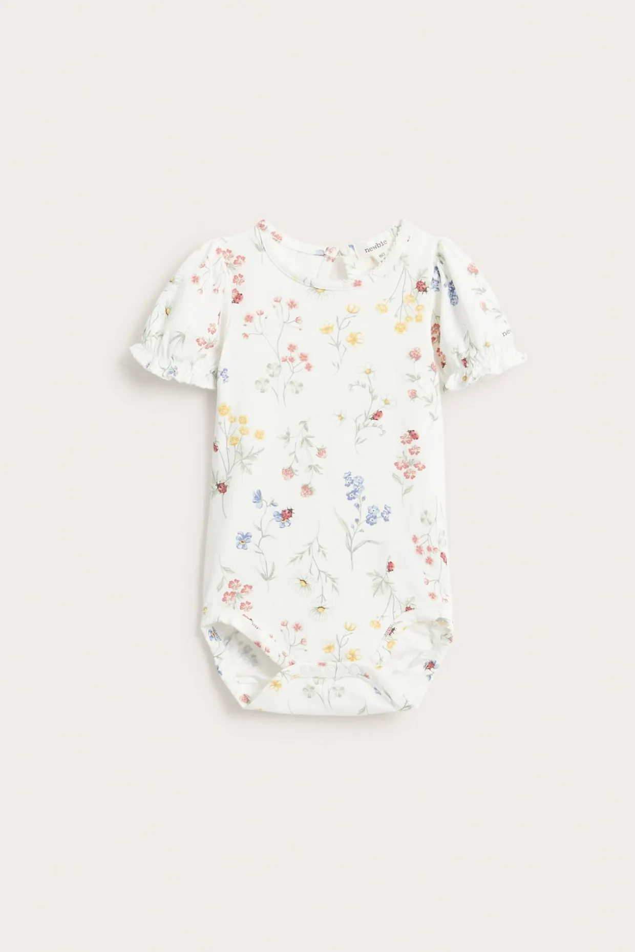 Blommig body med puffärm