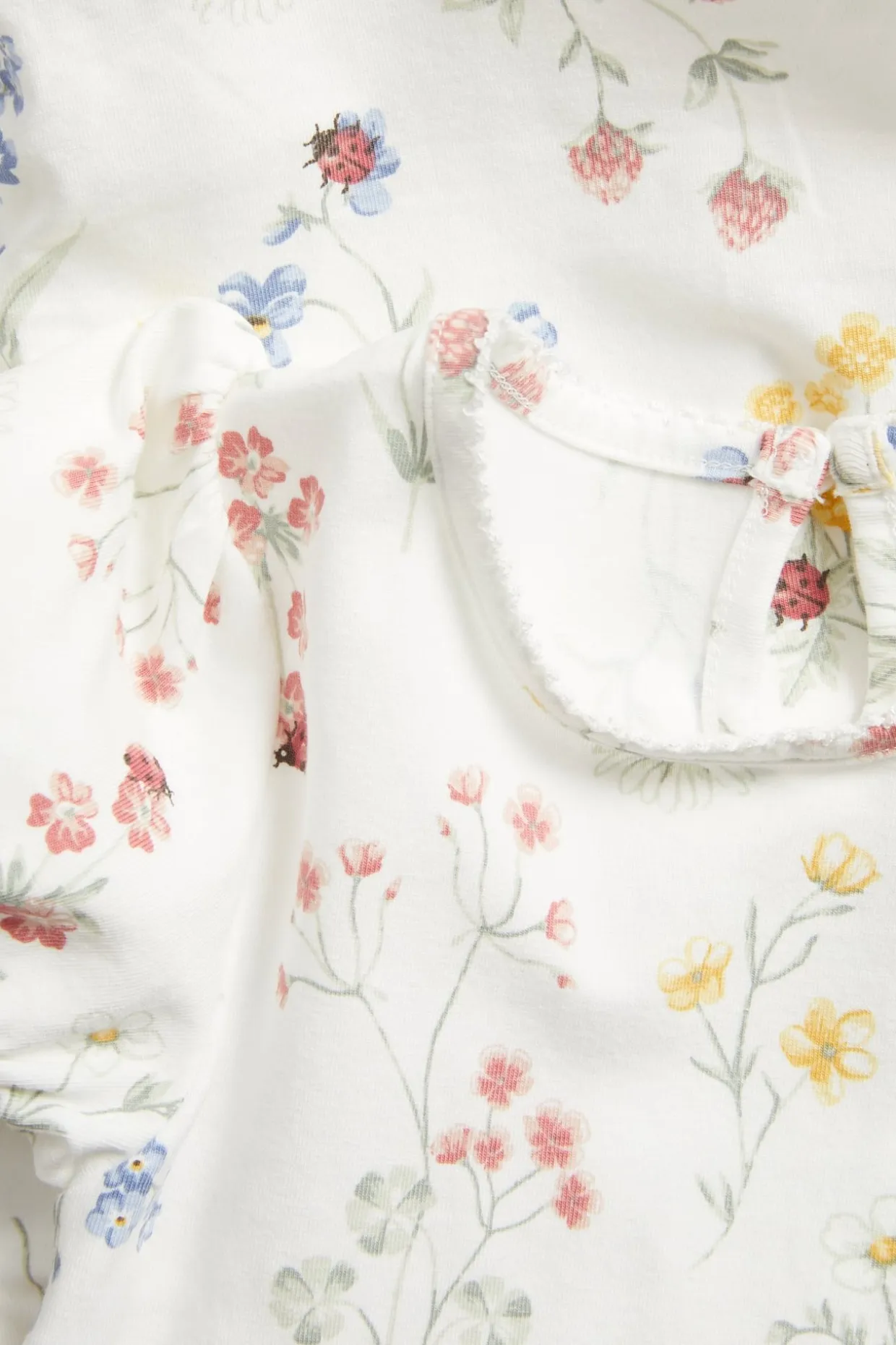 Blommig body med puffärm