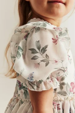 Blommig chiffongklänning