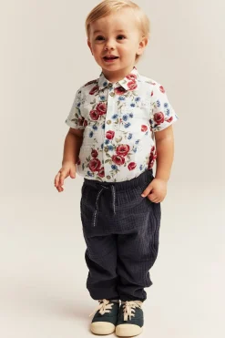 Blommig kortärmad skjortbody