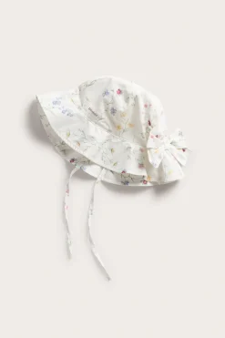 Blommig solhatt med rosett