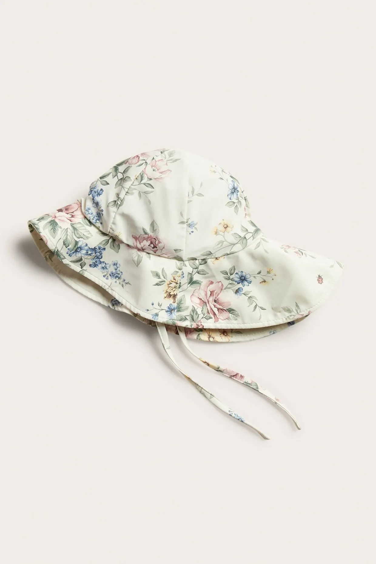 Blommig solhatt med UV-skydd