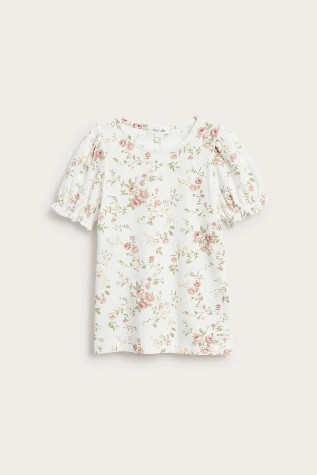 Blommig topp med puffärm