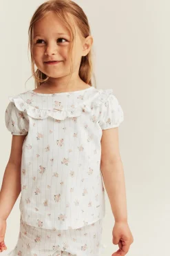 Blommigt pyjamasset med volang