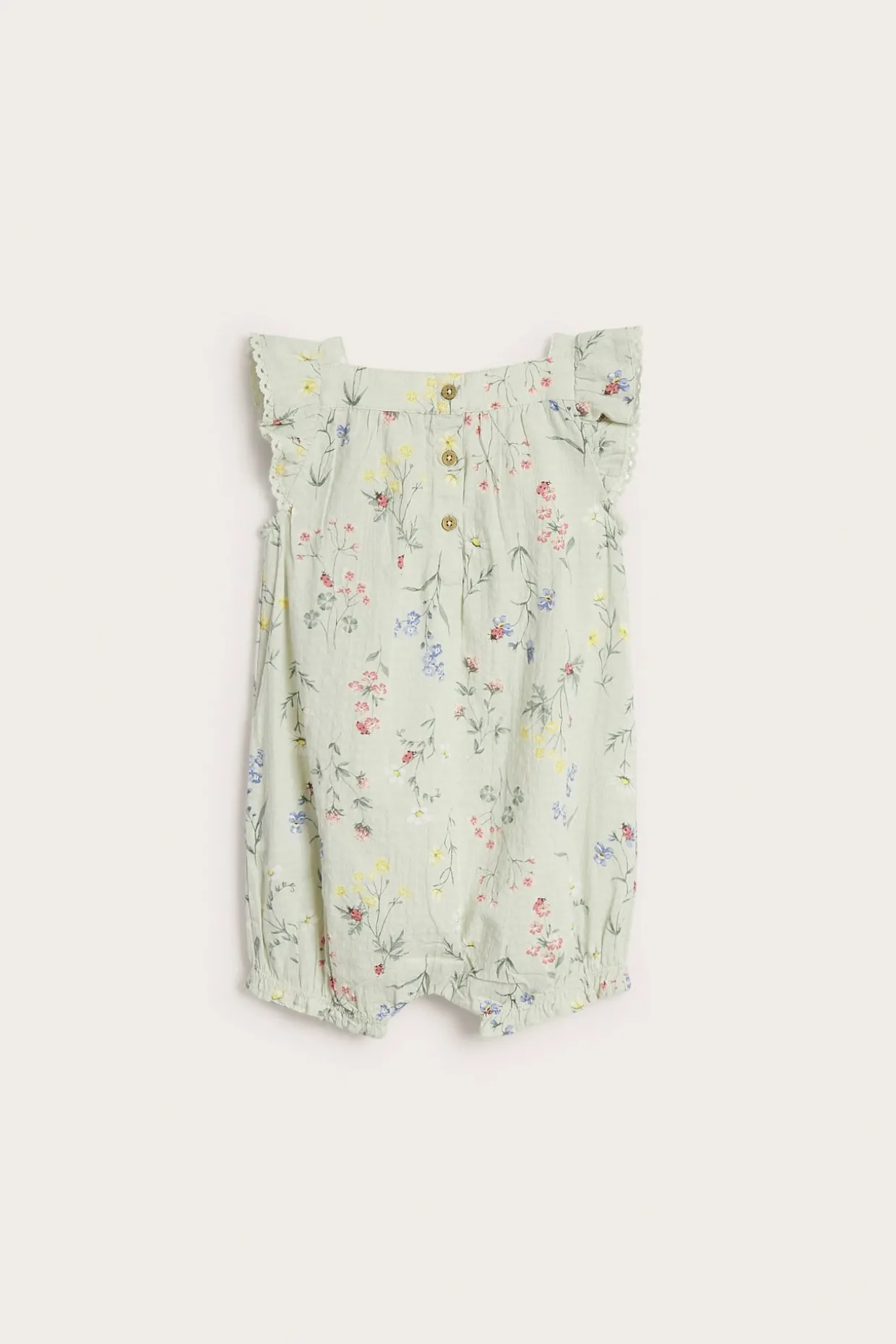 Blommig vävd romper