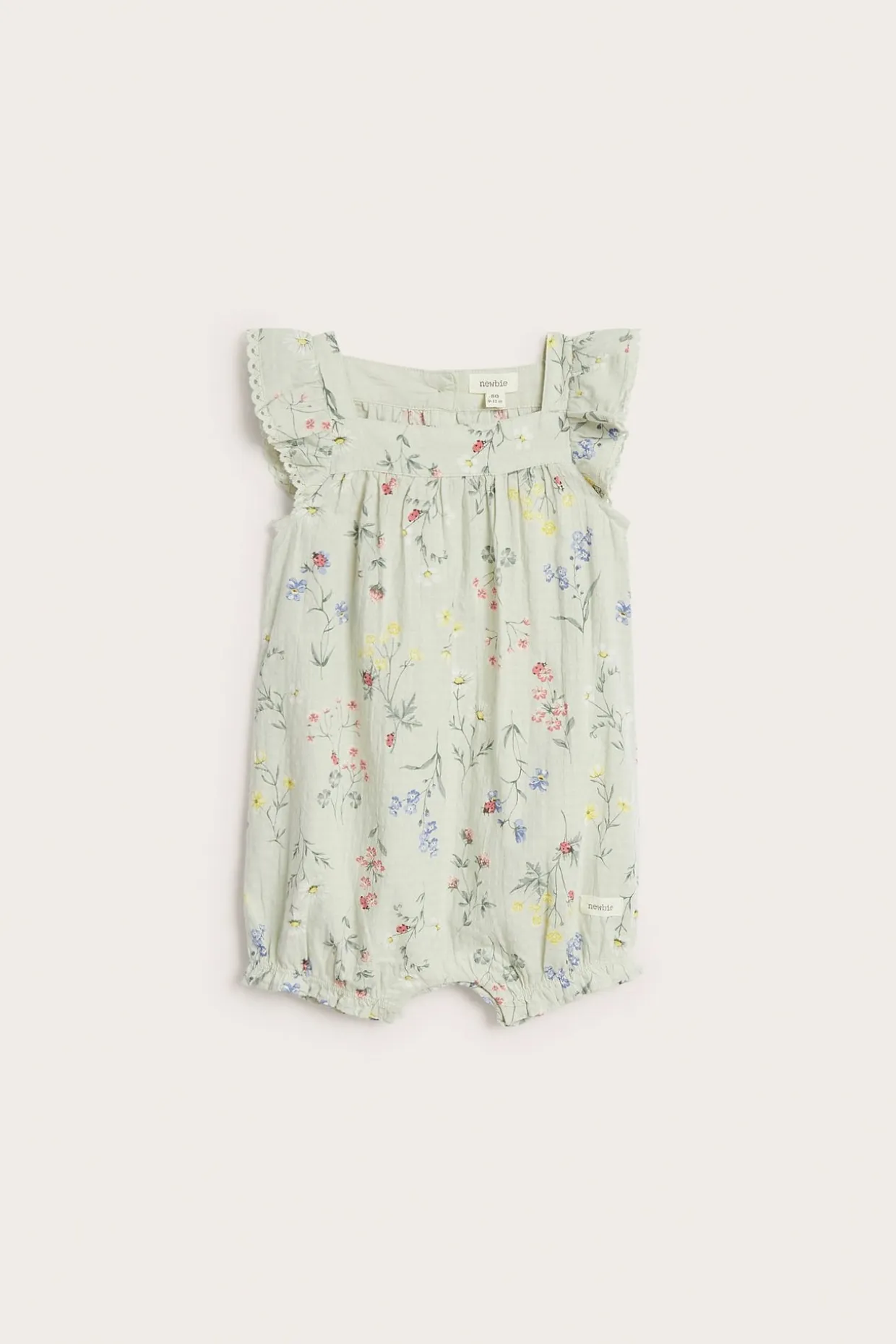 Blommig vävd romper