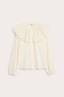 Blus med broderad cape