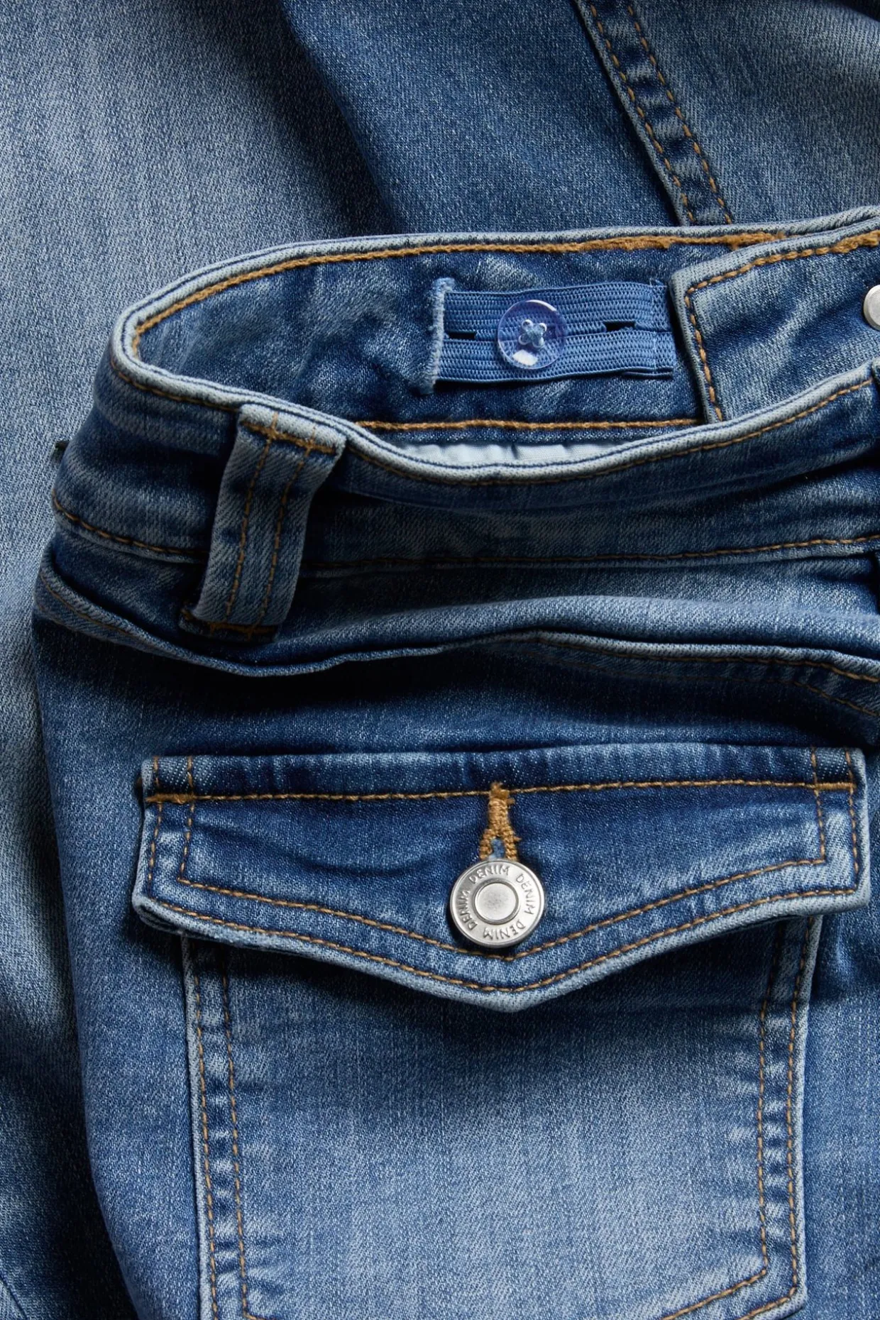 Bootcut jeans low waist med tvåfärgade ben
