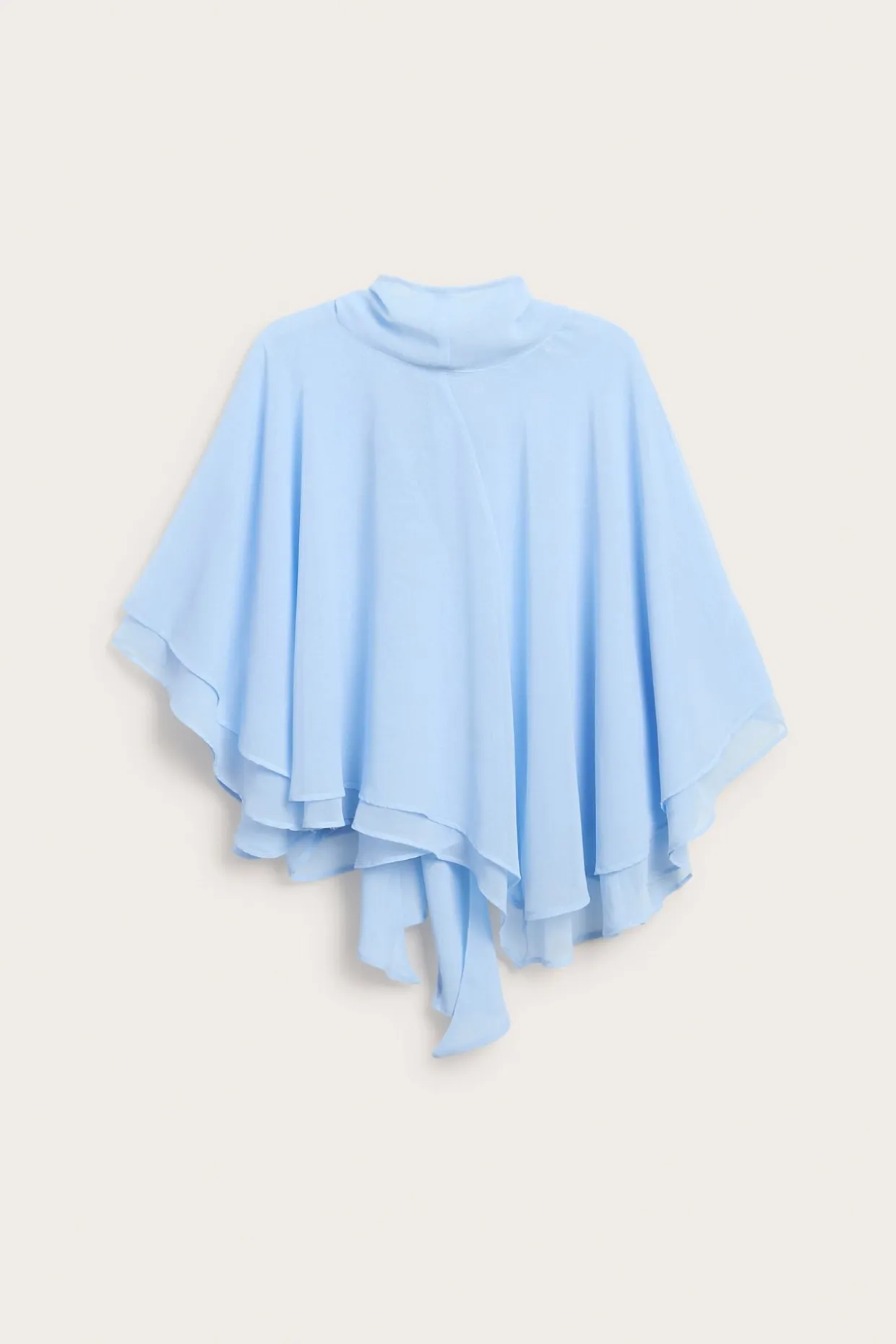 Chiffongblus med cape‑silhuett