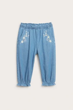 Denimbyxa med blombroderier