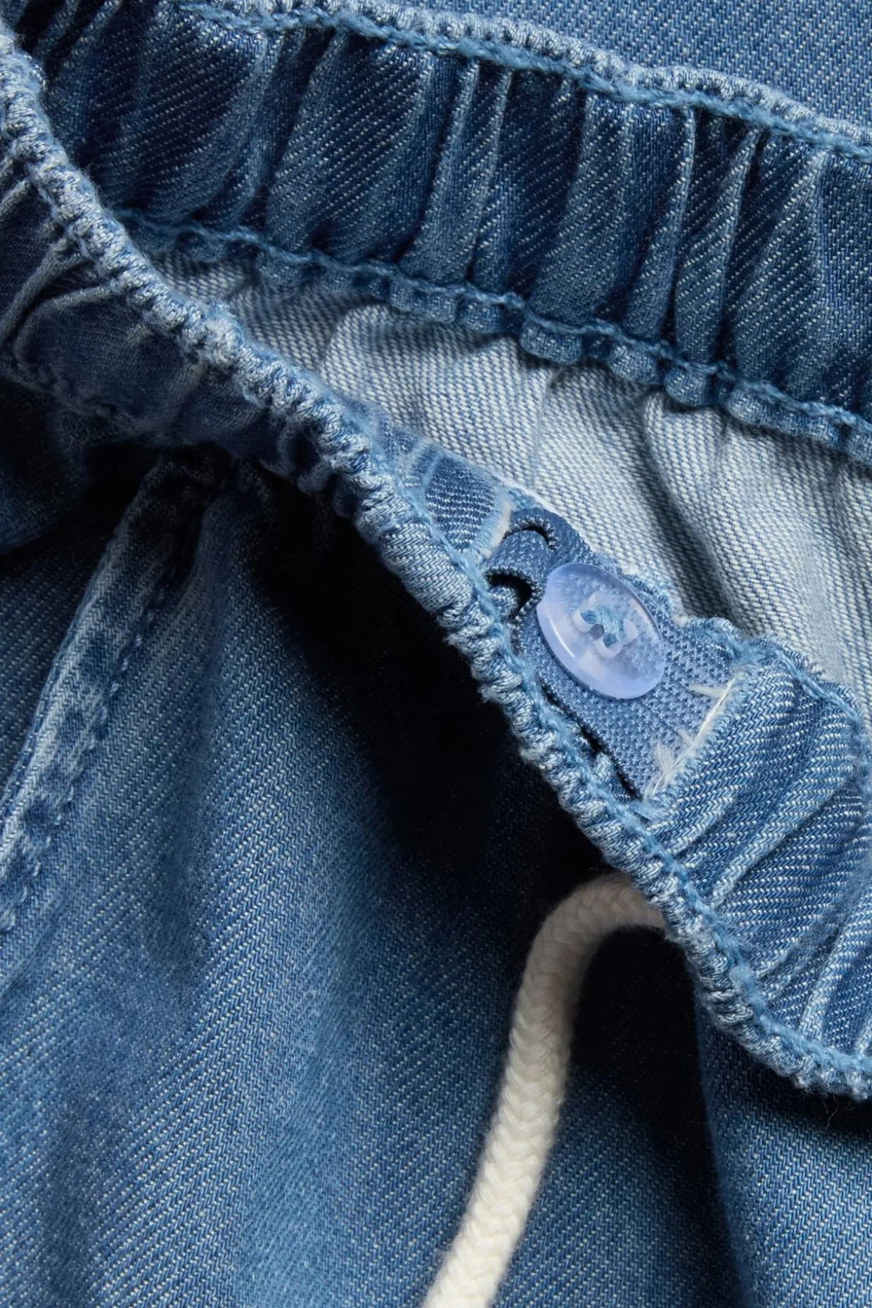 Denimbyxor med dragsko