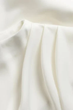 Draperad satinblus