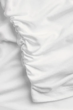 Draperad topp