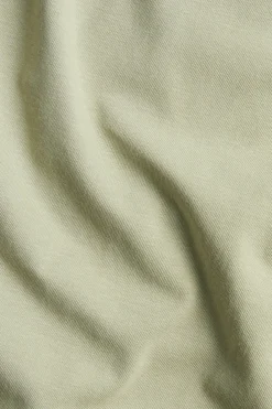 Kortärmad asymmetrisk topp