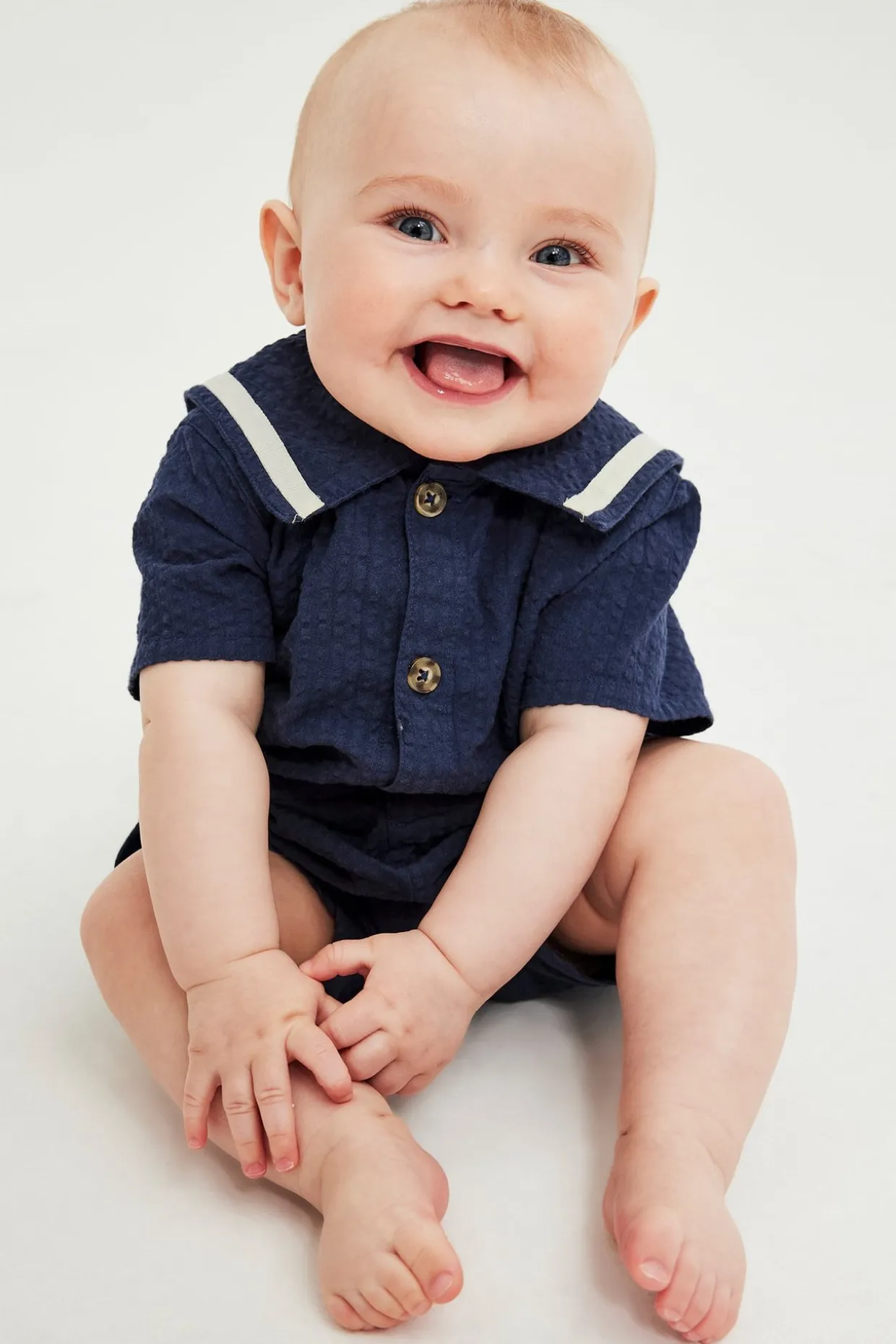 Kortärmad babyjumpsuit