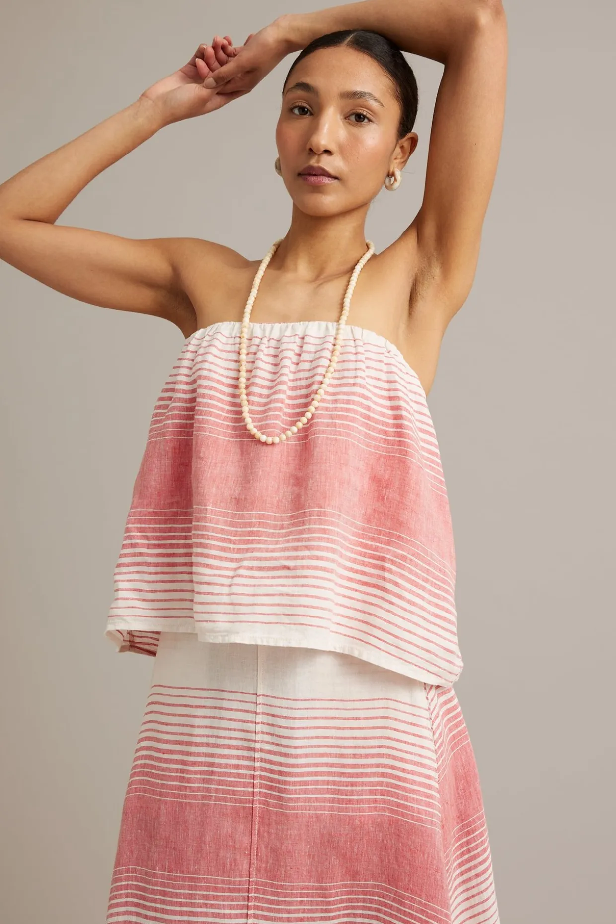 Linne med avtagbara axelband