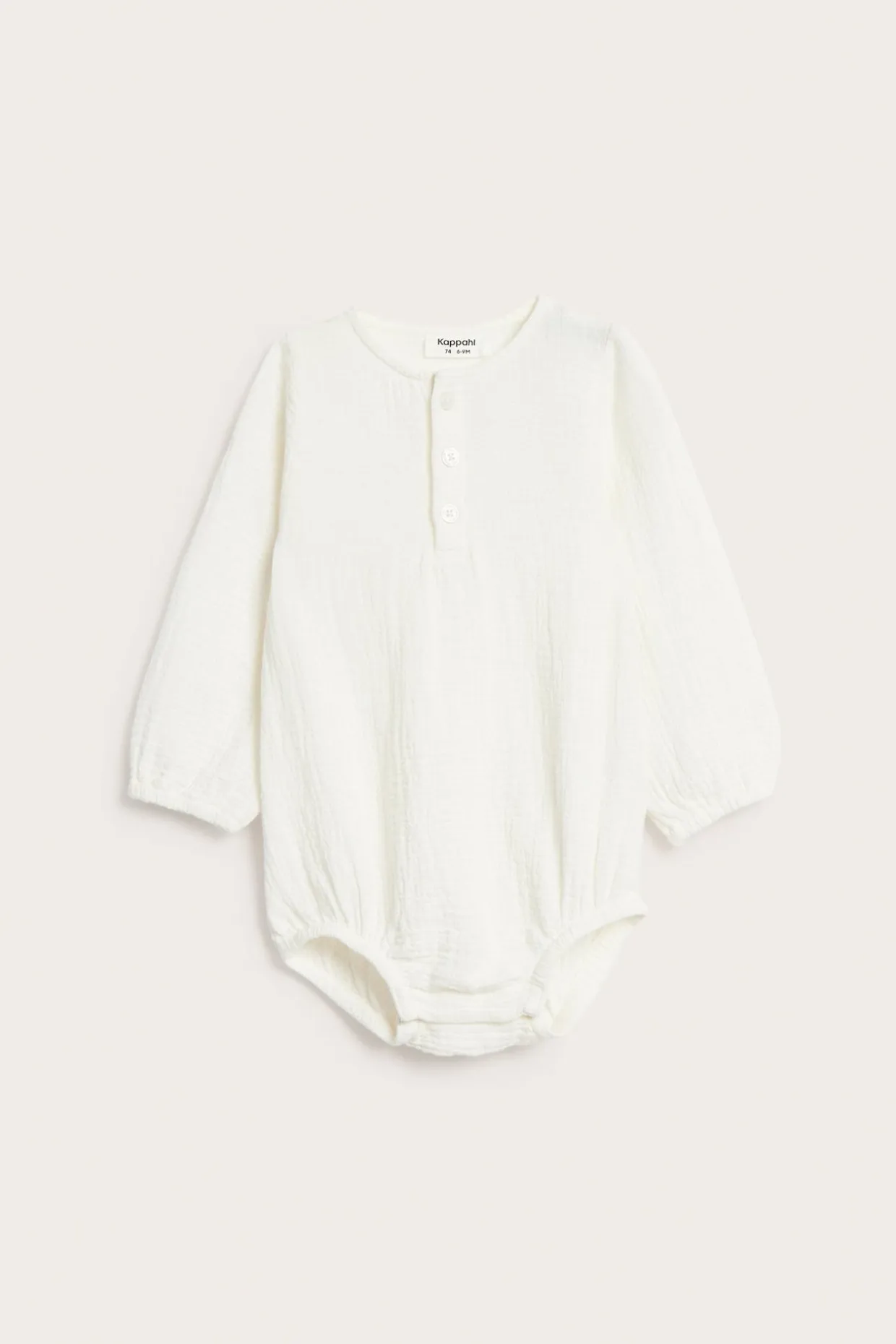 Långärmad body i muslin