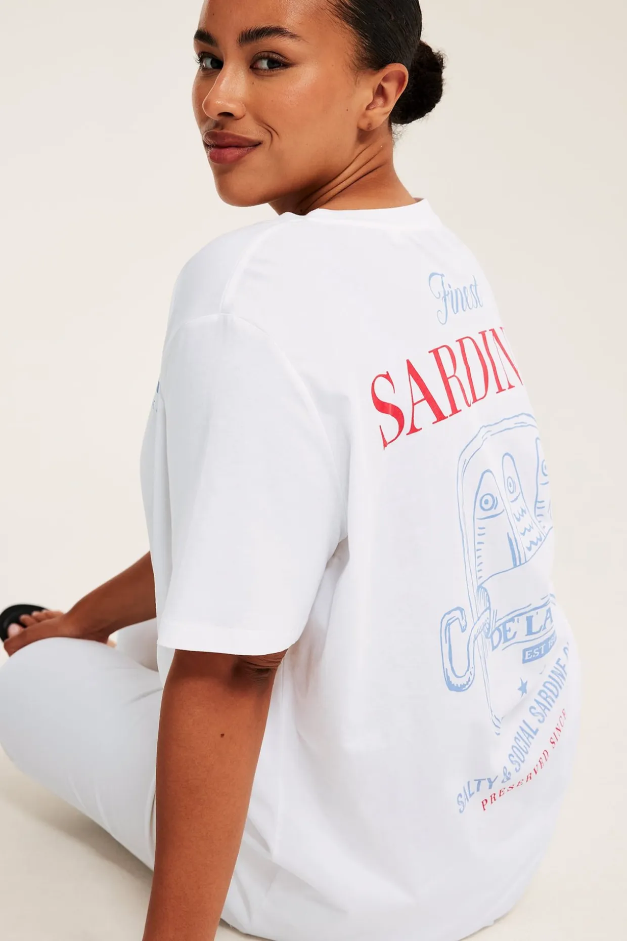 Lång t-shirt med tryckta motiv