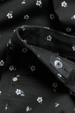Mönstrade twilljeans i bootcut-modell