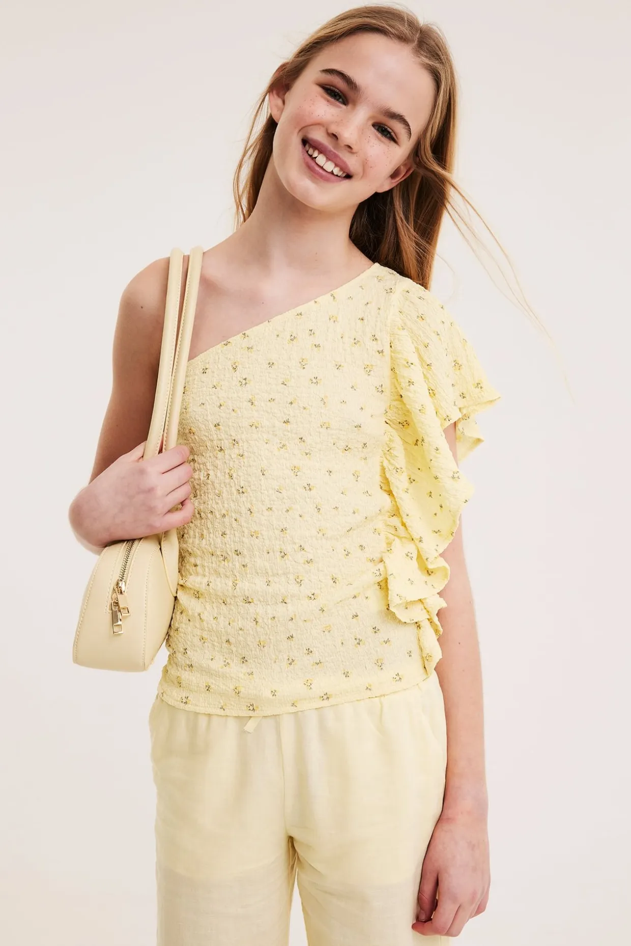 One shoulder-top med volang