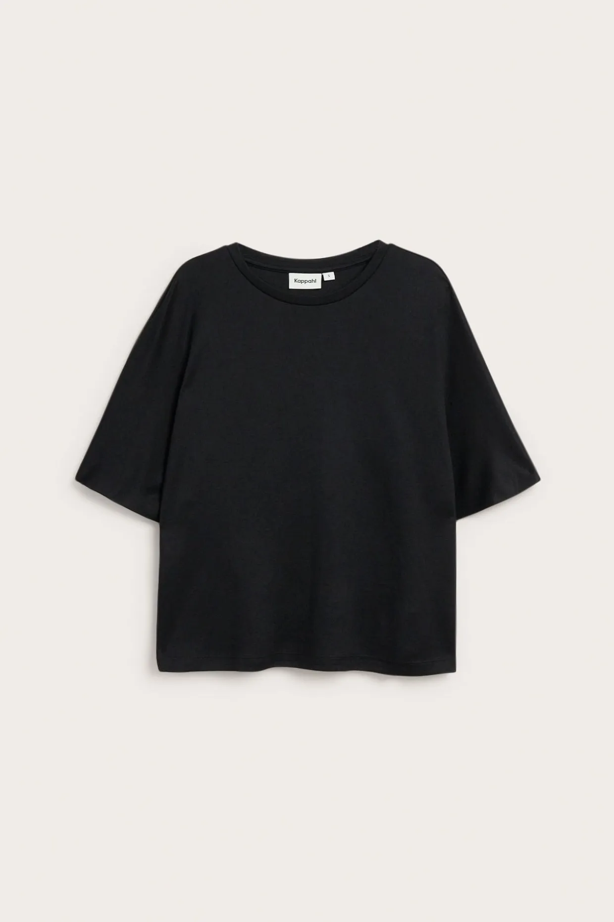 Oversized topp med kort ärm