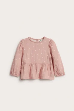 Peplumblus för baby i mjuk muslin
