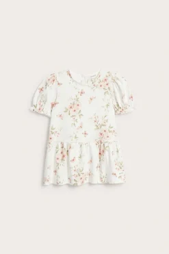 Peplumtopp med blommor och fjärilar
