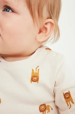 Ribbad body med lejonmönster