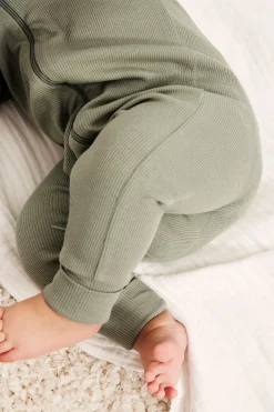 Ribbad jumpsuit med nedvikbara muddar