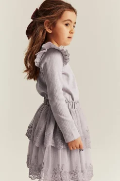 Ribbad topp med volanger