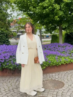 Ärmlös klänning i chiffong