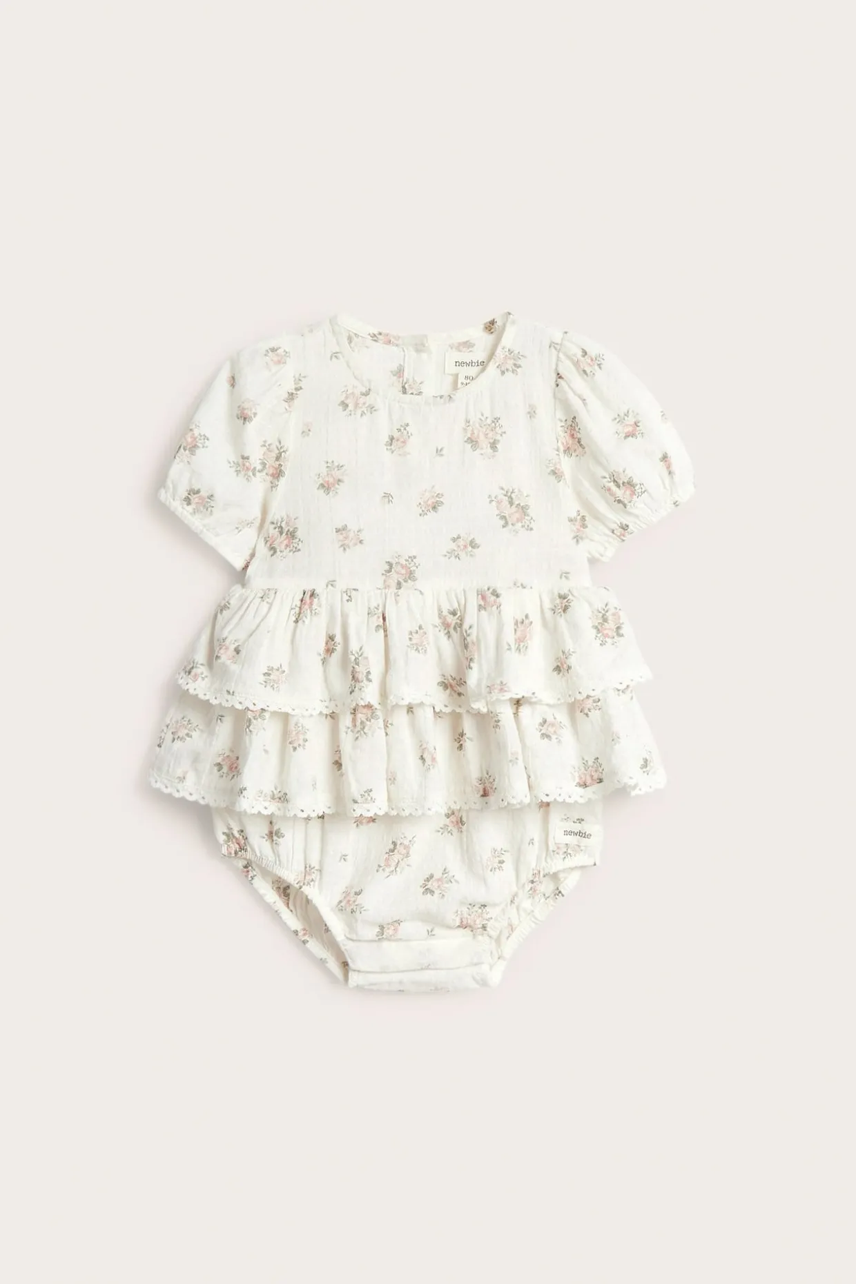Småblommig jumpsuit med volang