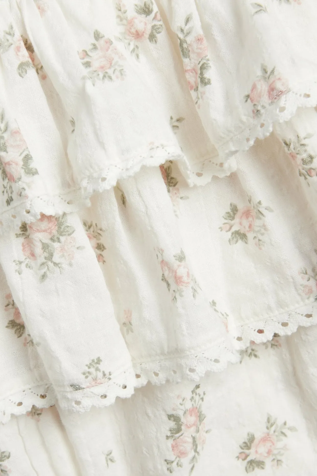 Småblommig jumpsuit med volang