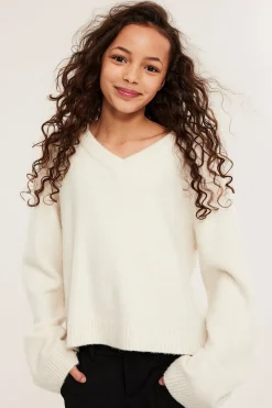 Stickad tröja med v-ringning