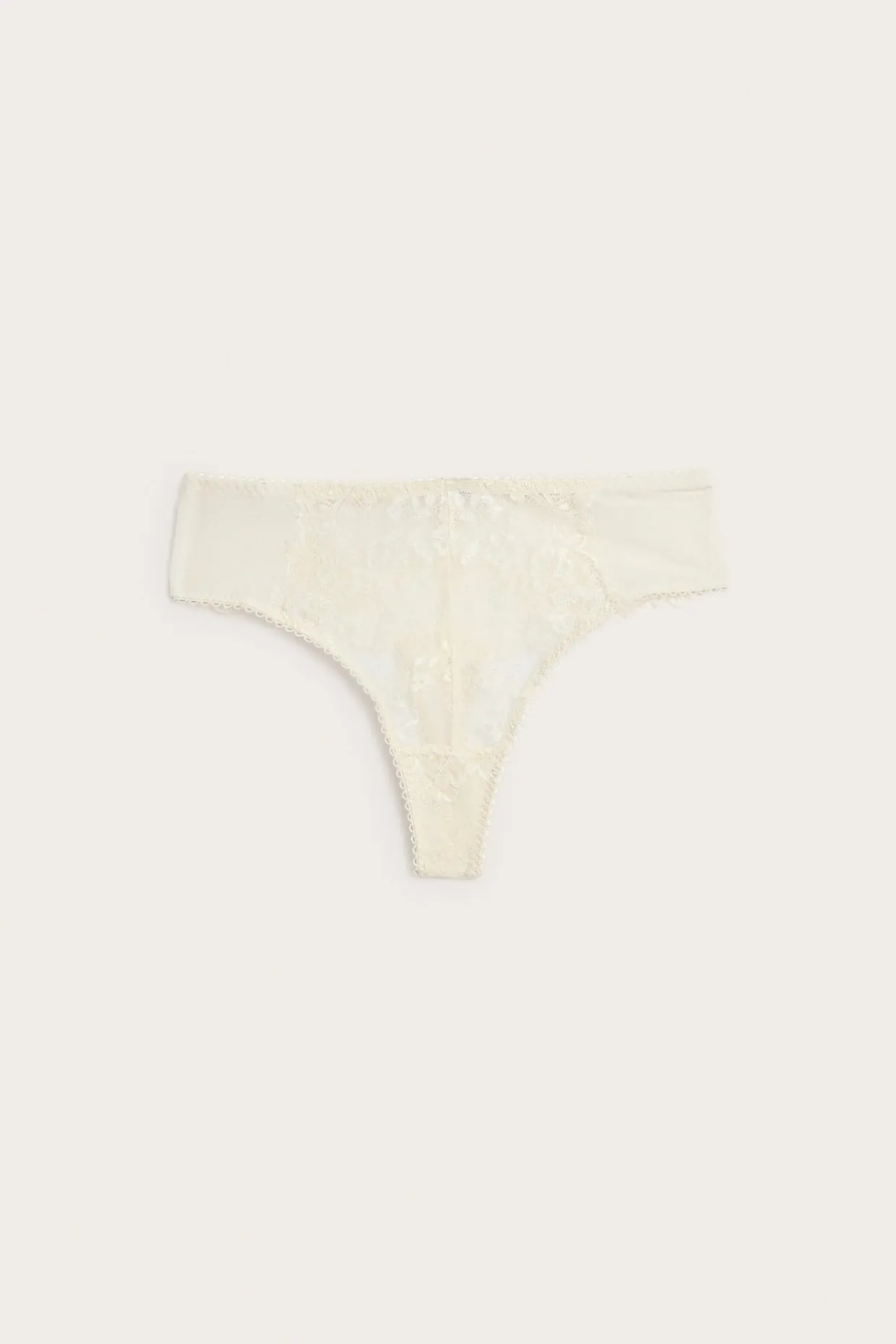 Stringtrosa med spetsdetaljer