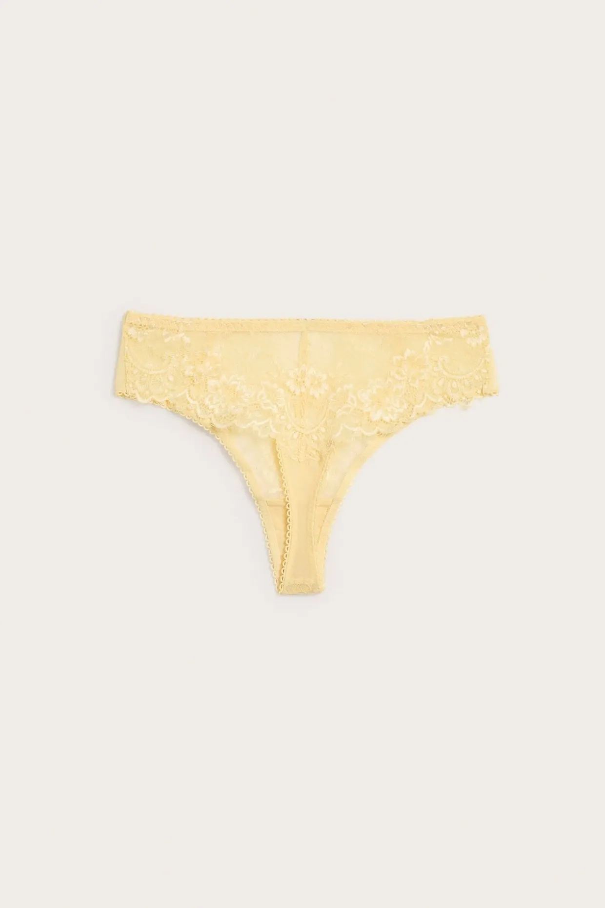 Stringtrosa med spetsdetaljer