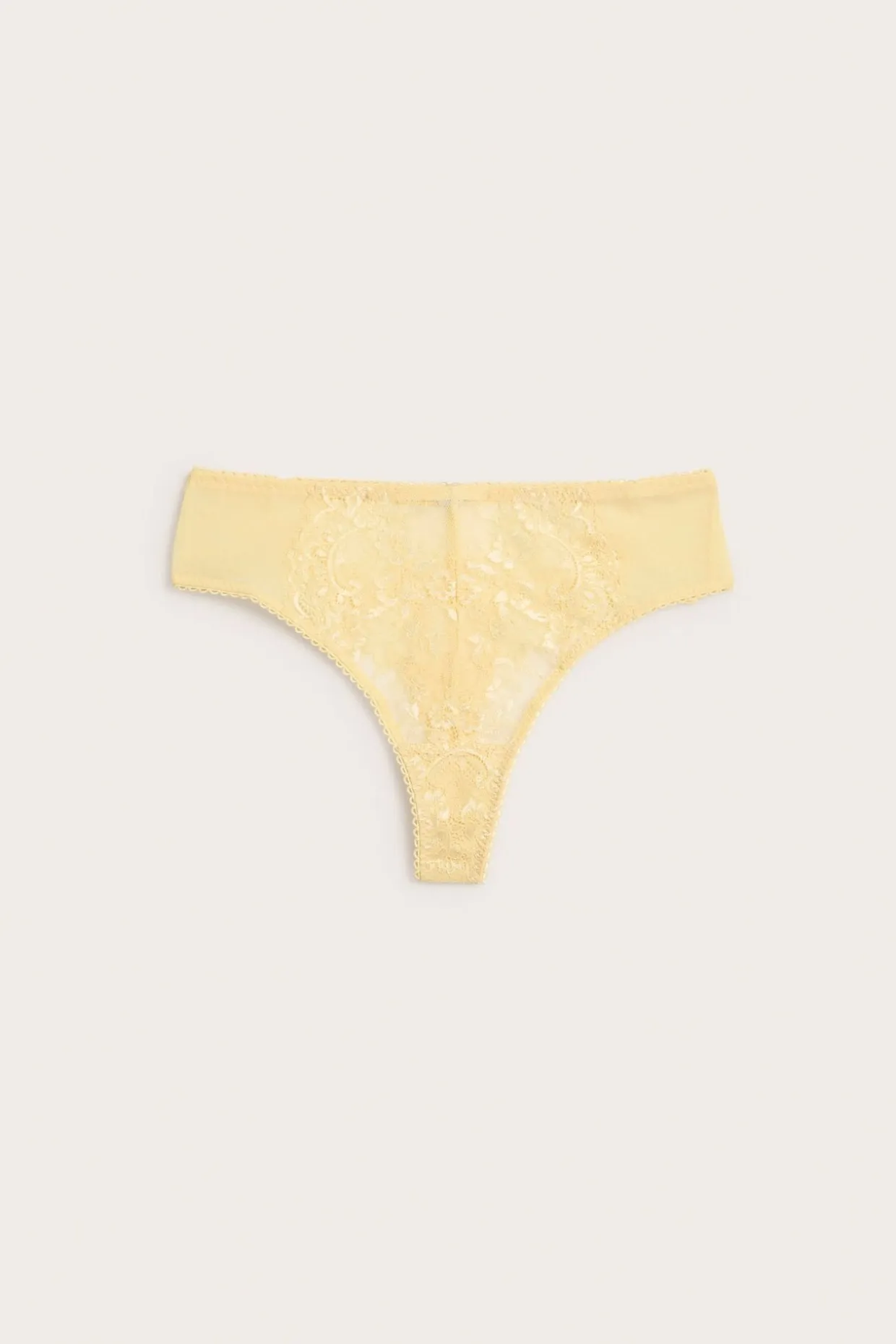 Stringtrosa med spetsdetaljer