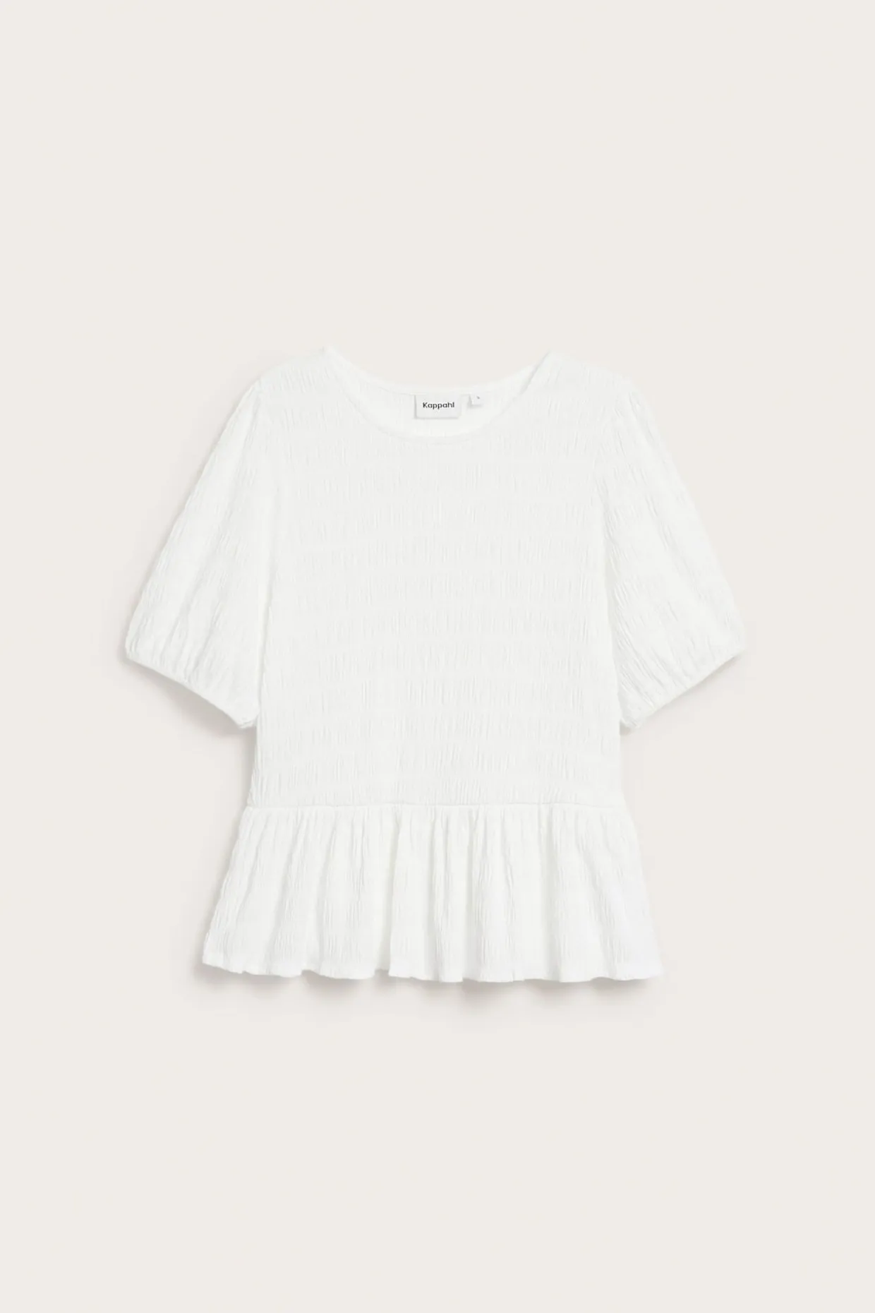 Strukturerad topp med peplum och kort ärm