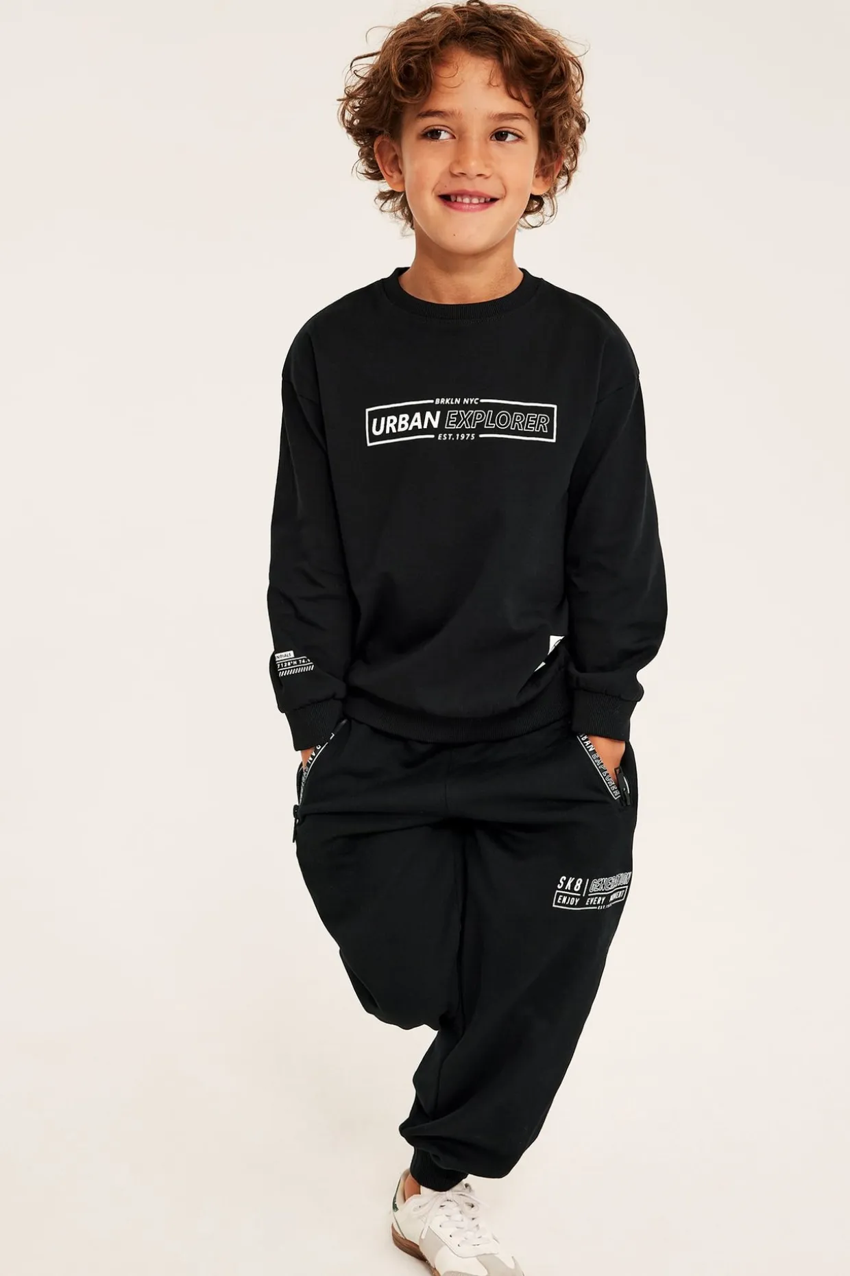 Sweatshirt i bomullstrikå med texttryck