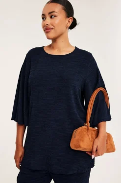 Topp med vida ärmar