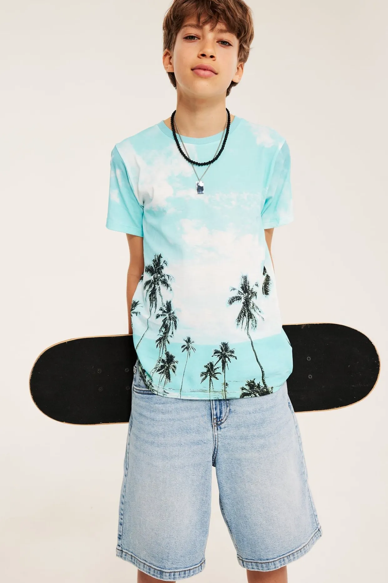 T-shirt i bomullstrikå med palmmotiv