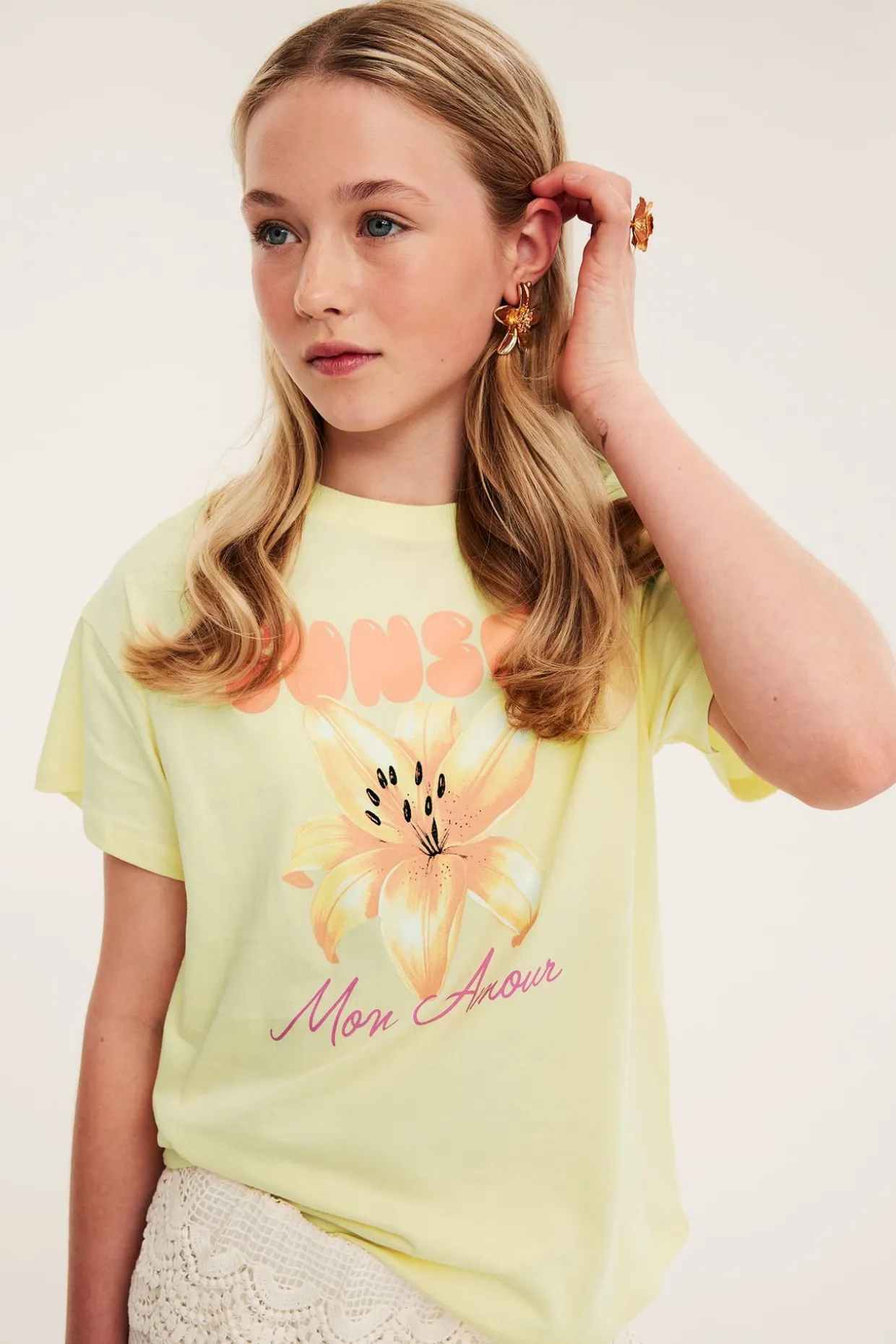 T-shirt med text- och blomsterprint