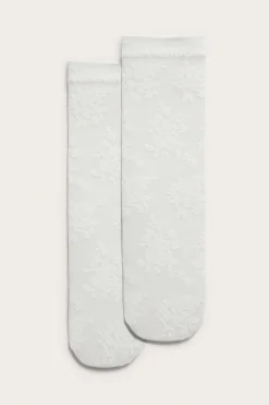 Tunna strumpor med blommönster