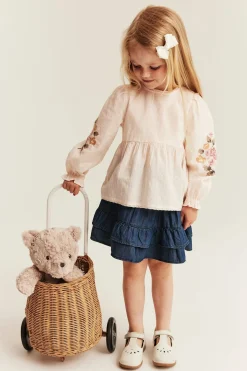Vävd blus med blombroderi