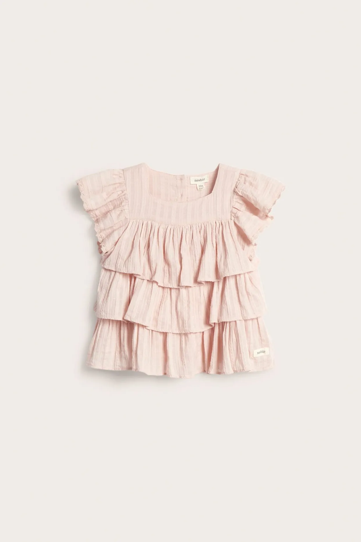Vävd blus med volanger